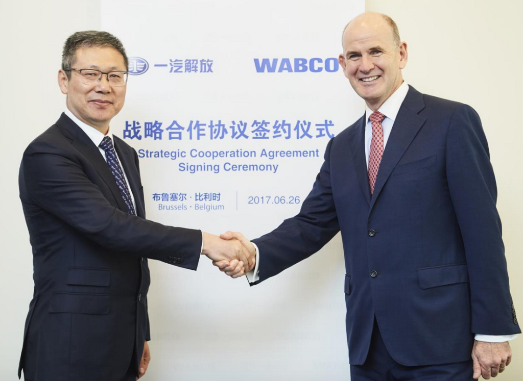 Pictured here are Hu Hanjie, General Manager at FAW Jiefang Automotive Company (left) and Jacques Esculier, Chairman and Chief Executive Officer at WABCO.