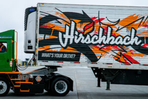 Hirschbach Motor Lines and Lineage Logistics Further Reduce Carbon Footprint with Orange EV Electric Yard Trucks